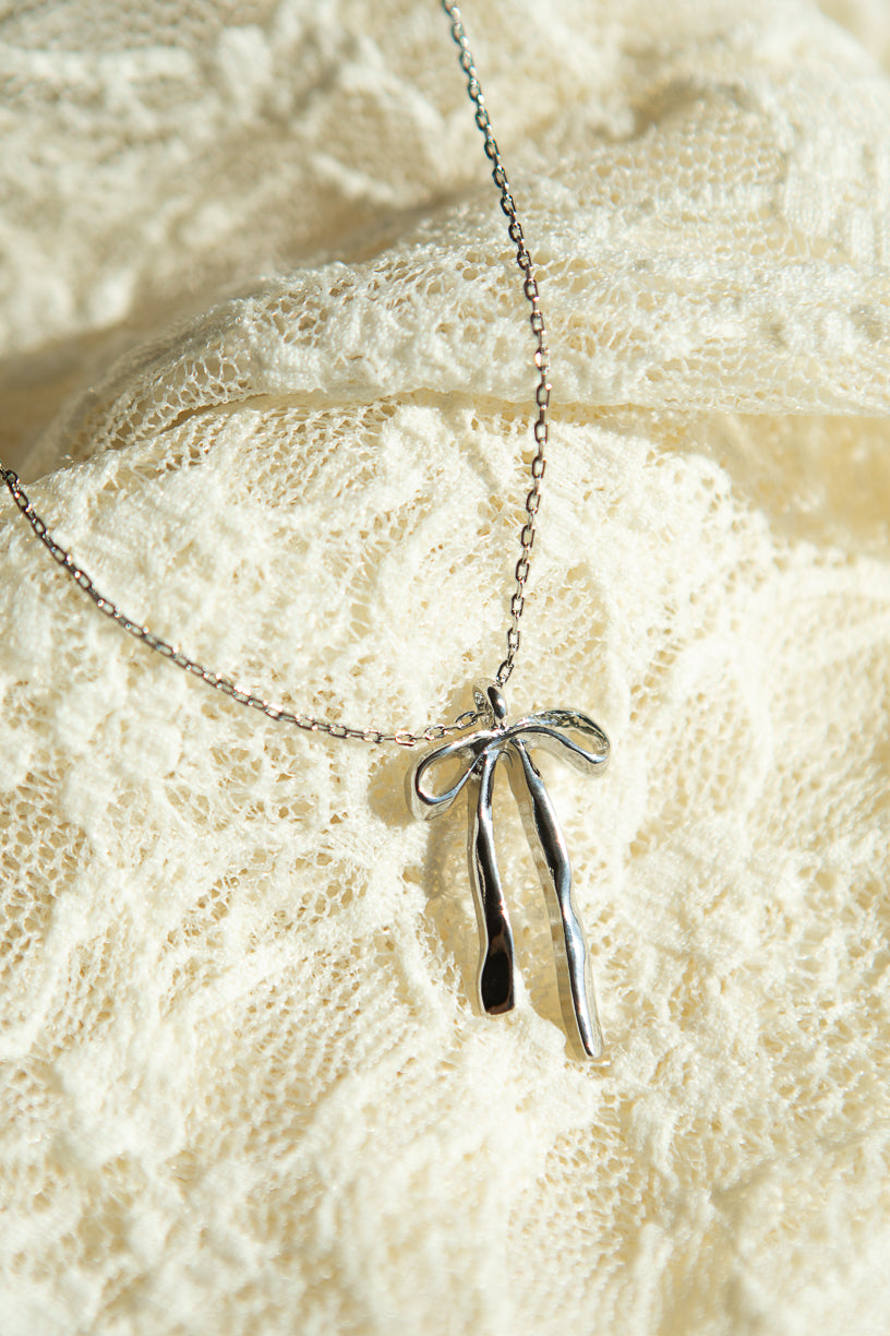 Silver Molten Bow Necklace