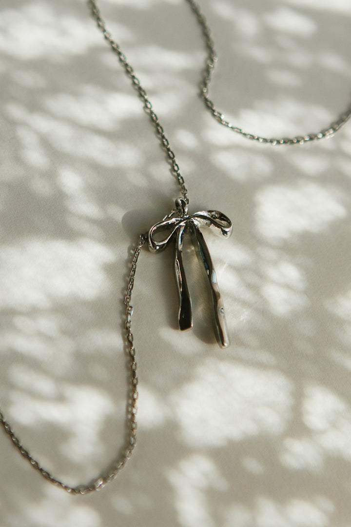 Silver Molten Bow Necklace